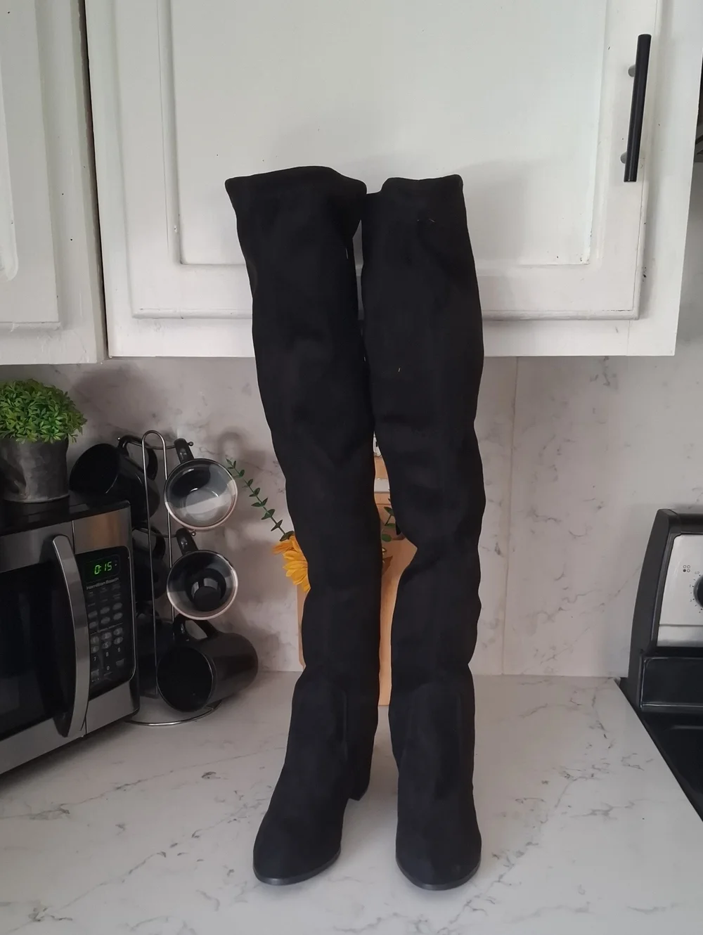 over-the-knee suede boots sleek black